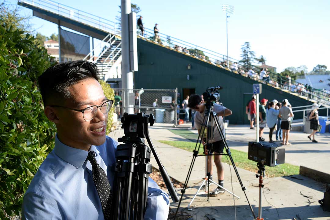 Truong packs up his tripod after the 45 minute show comes to a conclusion. 'Dude I'm so hungry,' Truong says. Alex G. Spanos Stadium, San Luis Obispo, CA. Oct. 26.
