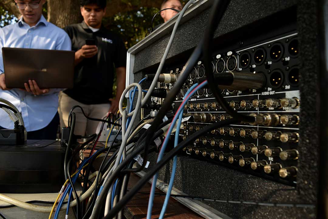 A multitude of cables are managed, most of which by the journalism department's broadcast engineer, Thomas Morales. Alex G. Spanos Stadium, San Luis Obispo, CA. Oct. 26.